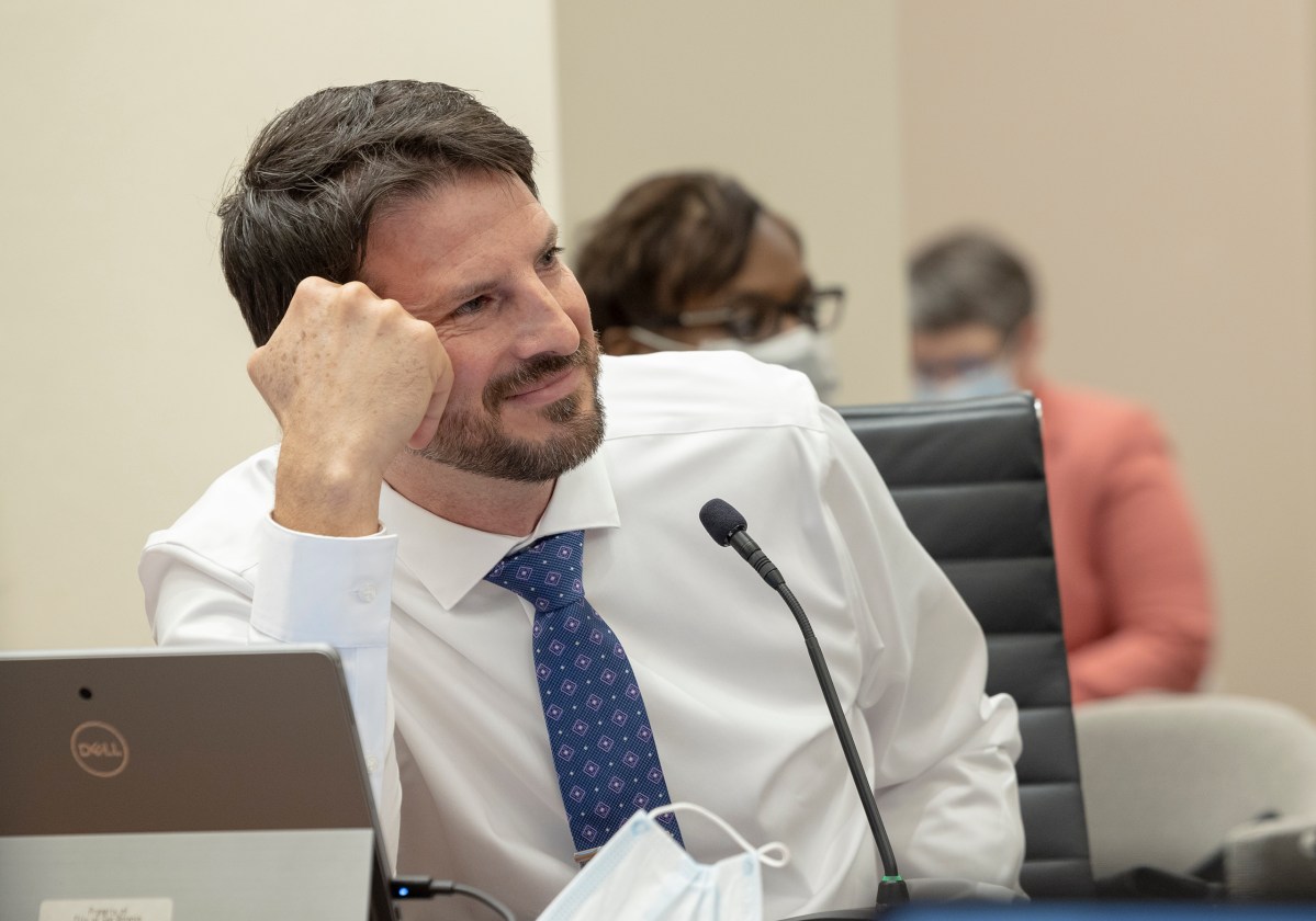 Former District 1 Councilman Mario Bravo listens during a city council meeting in 2021.