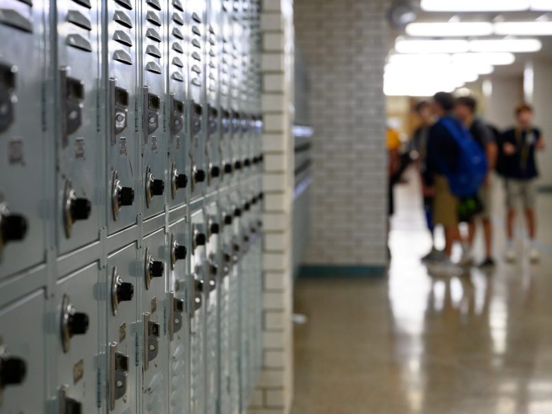 A Travis County judge temporarily blocked the Texas Education Agency from releasing school accountability ratings after dozens of school districts sued, claiming the new evaluation system would wrongly cause their ratings to drop.