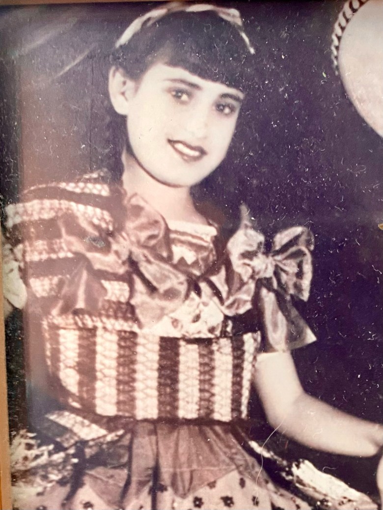 Portrait of a young Belle San Miguel Ortiz in folklorico attire. 