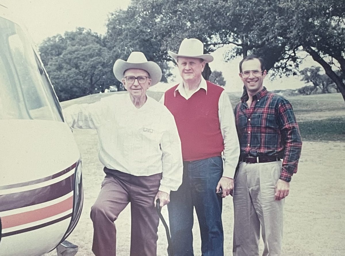 Red McCombs, center, and Marty Wender, right, getting ready to take American author James Michener on a helicopter tour of San Antonio.