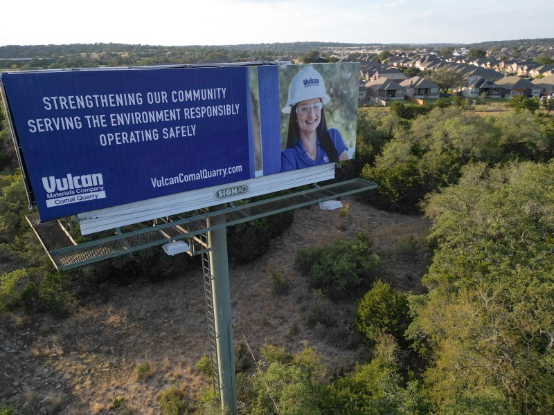 A billboard by Vulcan Materials advertises employment and responsible environment practices near the site of the proposed quarry. Residents of the hill country are opposed to the building of a quarry between New Braunfels and Bulverde.