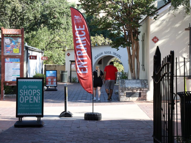 Signs point visitors towards shops and restuarants that are open for business in La Villita as ongoing construction obstructs some of the paths.