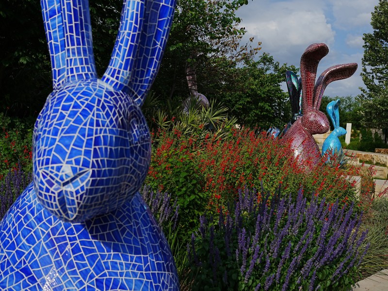 Large-scale bunny sculptures by Hunt Slonem adorn the San Antonio Botanical Garden for the upcoming exhibit Huntopia.