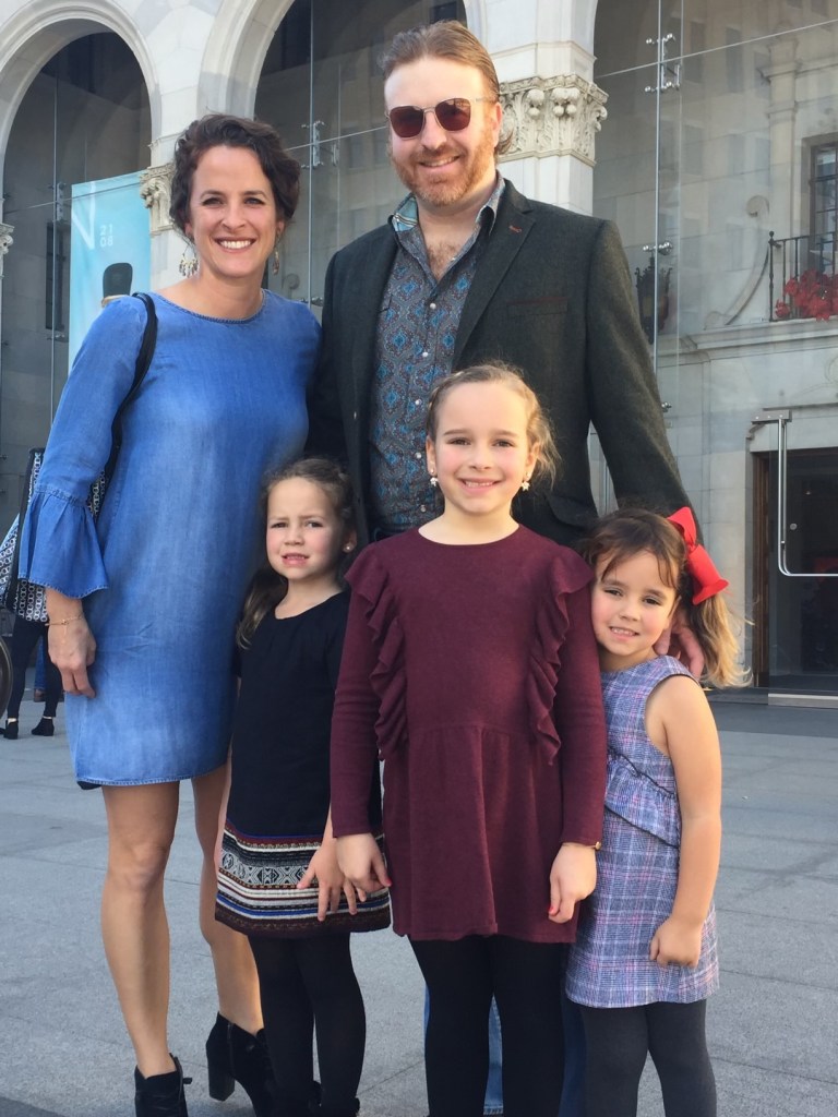 Blayne Tucker (center) poses for a photo with his sister Jennifer Yantis, & nieces Lili, Thea, Grace.