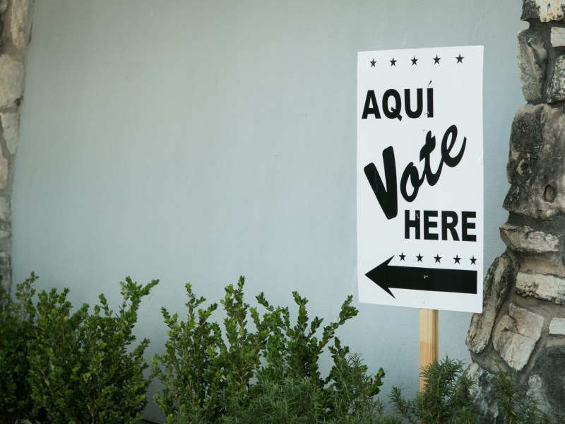 A sign indicates where to vote at the early voting site at Lions Field.