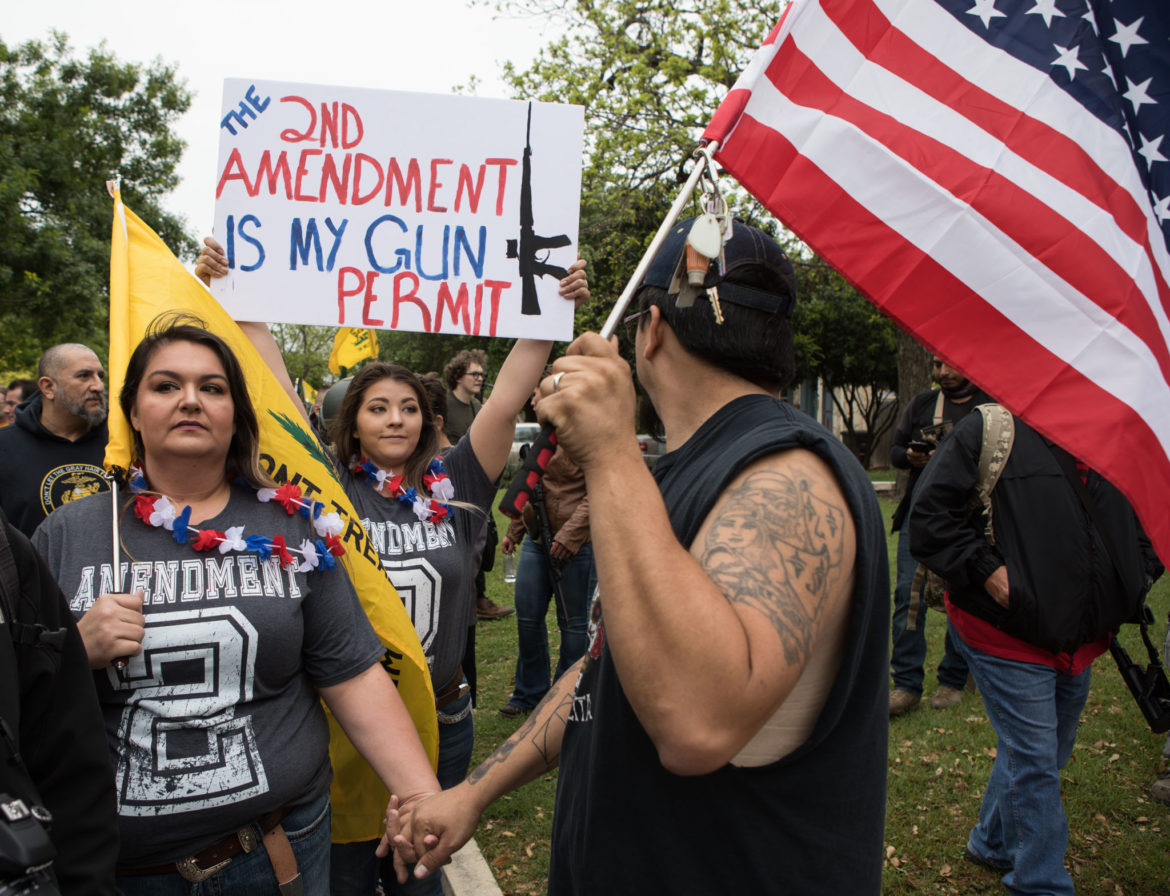 People participate in a Second Amendment rally in Olmos Park in 2018.