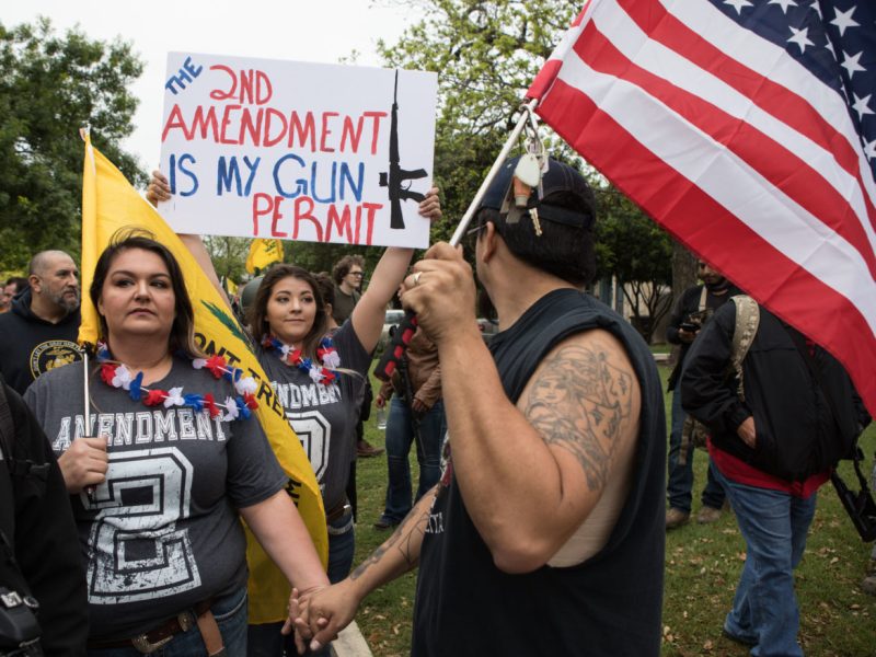 People participate in a Second Amendment rally in Olmos Park in 2018.