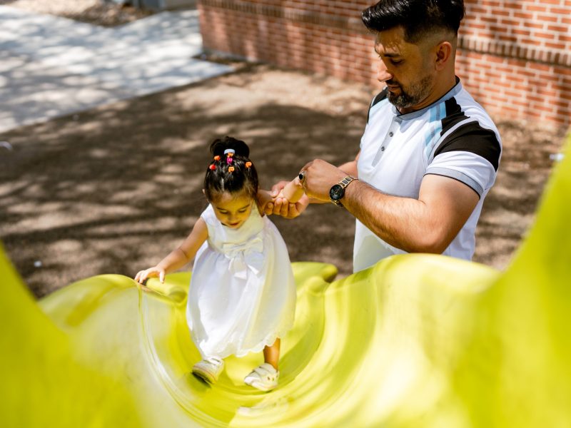 Bilal and his daughter Mahsa plays with his 17-month-old daughter Mahsa in his home.