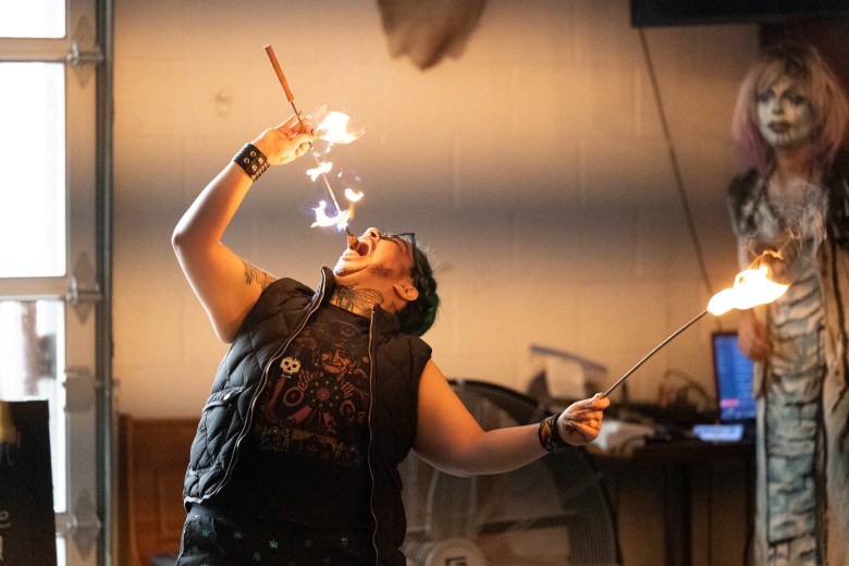 Sir Gio performs with fire for a 21 and over crowd during a drag show at Küntstler.