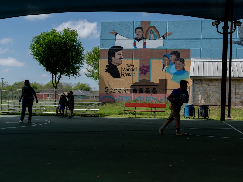 Children play outside of the Father Manuel Roman Community Center