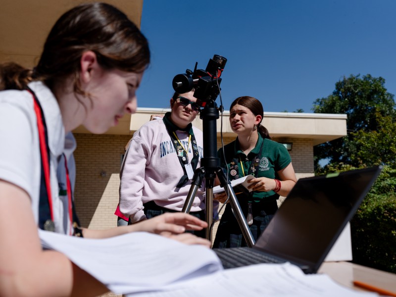 Incarnate Word High School students Rory Sorola, Mackenzie Carswell and Madeline Cernoch practice to photograph the eclipse on April 8 with equipment provided by NASA.