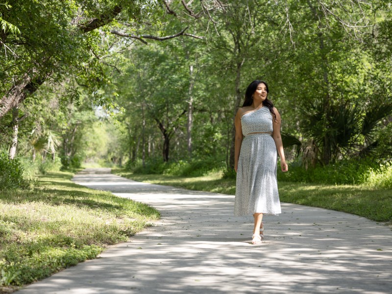 Victoria Herrera enjoys the scenery as she walks through Stinson Bike and Hike Trail.