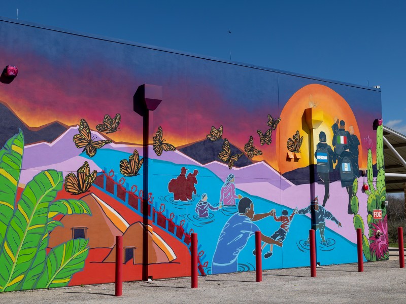 Sacrificios is the title of this new mural dedicated to the 53 migrants who died in the sweltering heat trapped inside of a trailer on the Southside in June 2022. Four artists painted the mural in Mission County Park.