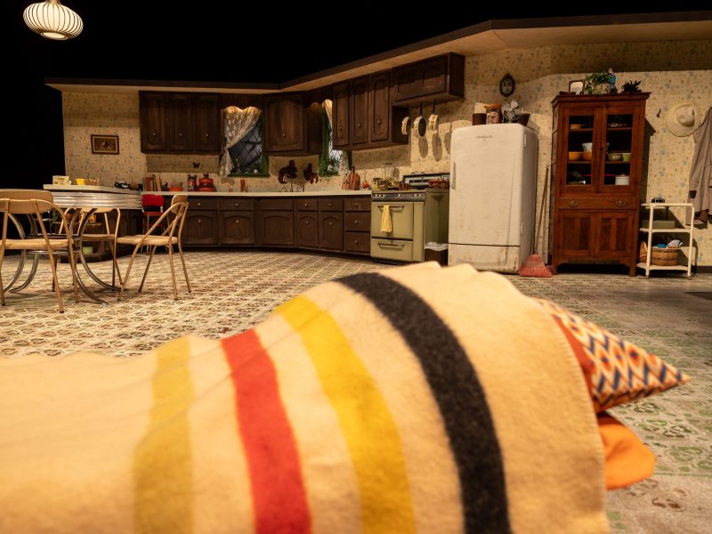 Artist Jeremiah Teutsch researched and designed the set for the 100A Productions version of Crimes of the Heart, on view at the Carlos Alvarez Studio Theater inside of the Tobin through March 17. The design of the kitchen was inspired by what a home built in the 50s and renovated in the 60s using a Sears and Roebuck catalog might have looked like.