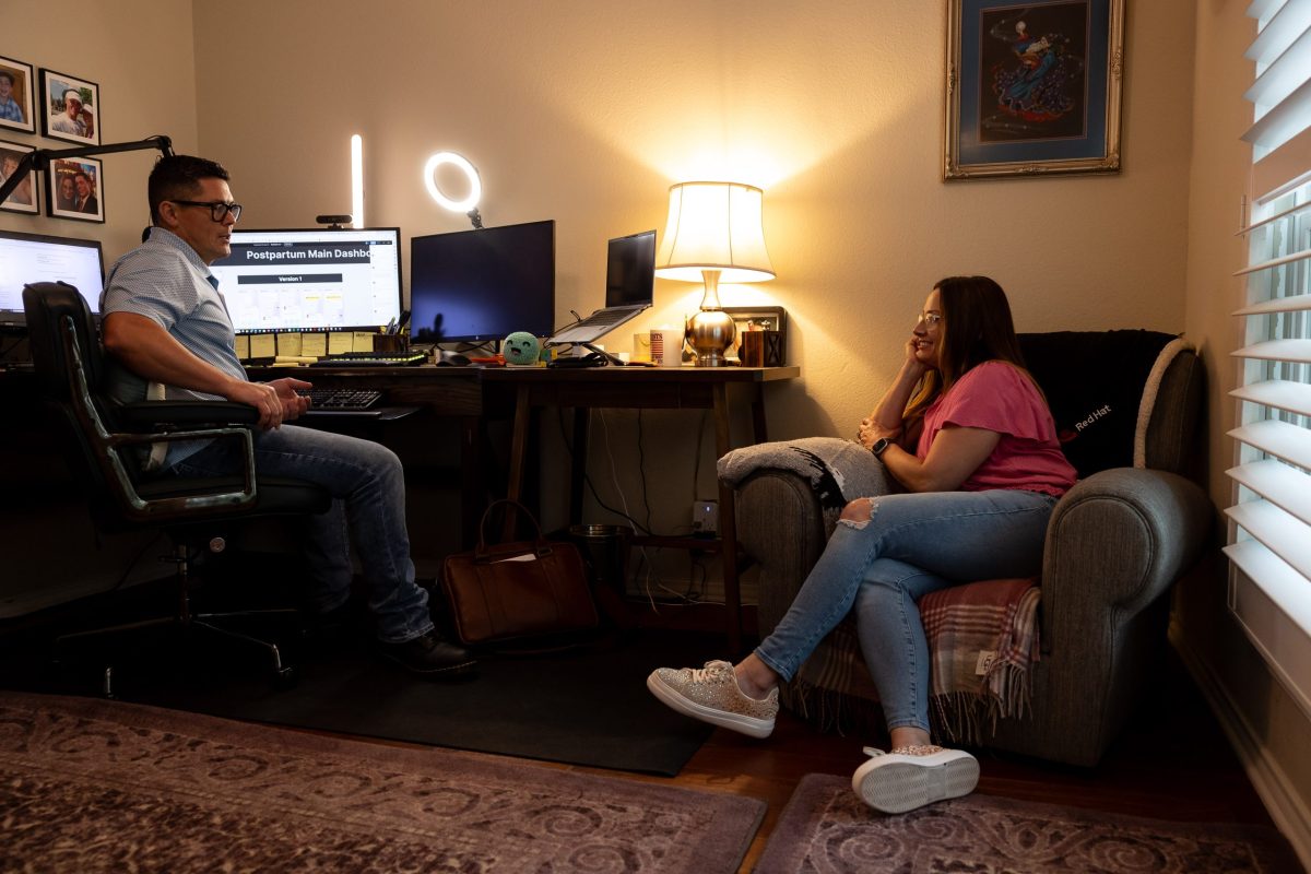 Dave Esra and his wife Sarah Webb-Esra work together on BobiHealth inside of their home office.