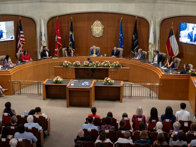 City Council members participate in an inauguration ceremony inside City Council Chambers in June.