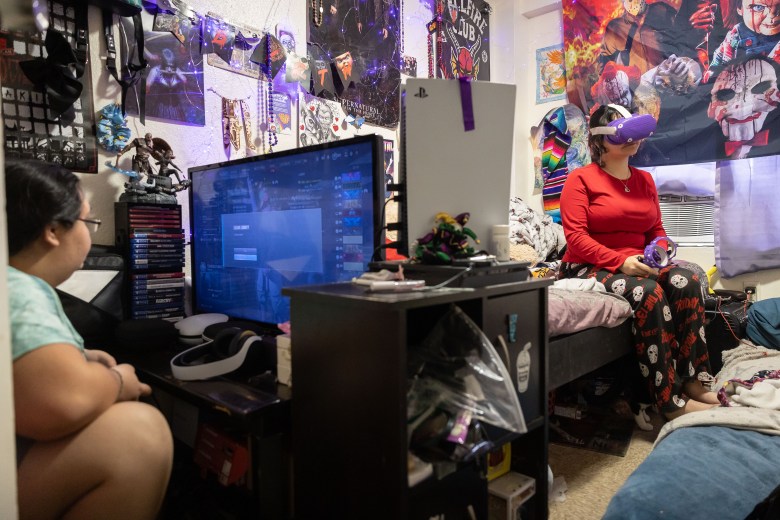 Nadia Miranda-Colgrove,19 (left) and her sister Melody Miranda-Colgrove, 14 share a room in their home in the Alazán-Apache Courts.