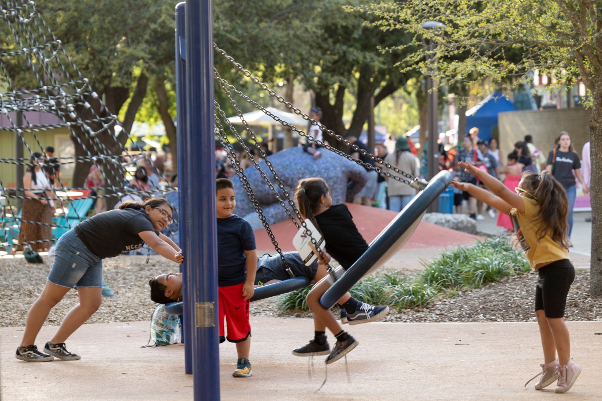 Children play at Hemisfair's Yanaguana Park.