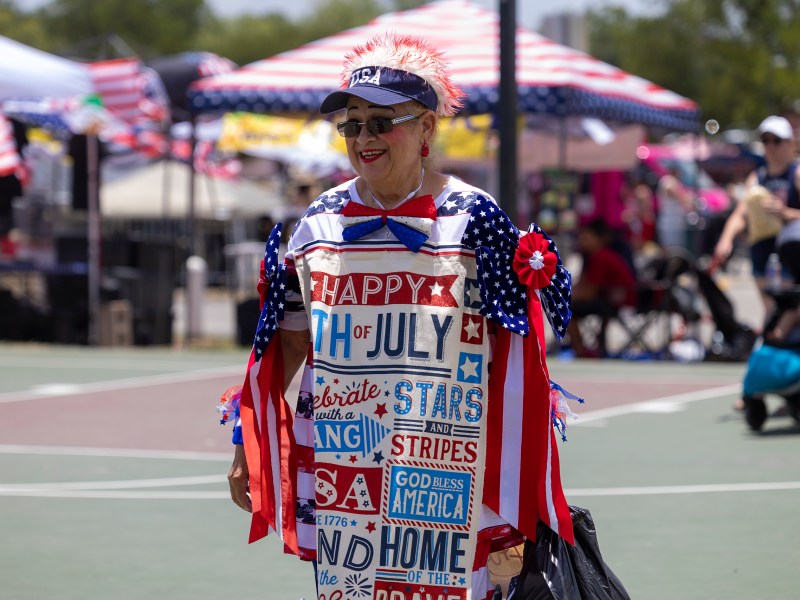 Sovia Lauriano wears a patriotic costume to celebrate Fourth of July in Woodlawn Lake Park on Monday.