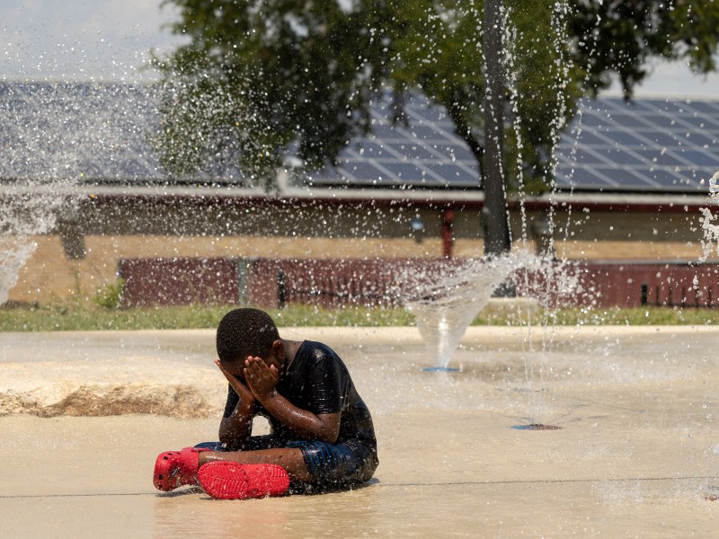 Q Wilson, 9, cools off in the splash pad at Lincoln Park in July. Triple digit temperatures continue to plague South Texas in a record-setting summer of heat.