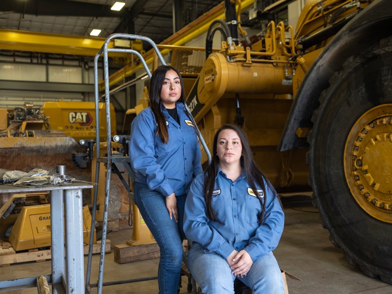 Shop technician Vaneza Zepeda (left) and Maria Mendez, lead technician, both worked as interns at Holt Cat before securing jobs there.