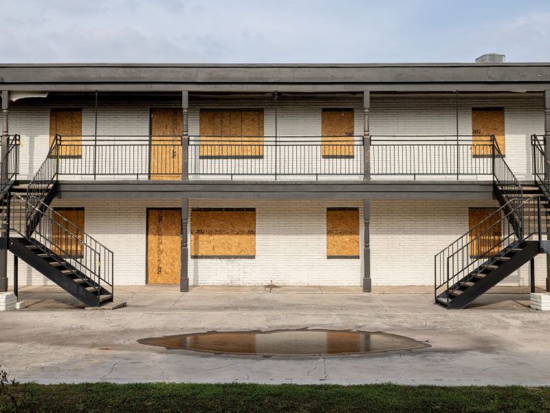 One of the buildings in The Hudson Apartments is boarded up following a fire in March. SAMMinistries' operates the apartments, which houses individuals who are experiencing homelessness.