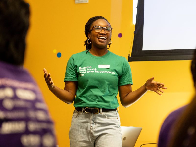 Jasmine Paul teaches students from CAST High Schools about budgeting and personal finances during their annual Youth Rally at the DoSeum last week. Paul is the founder of Wealth Playground, designed to teach people of all ages about money management.