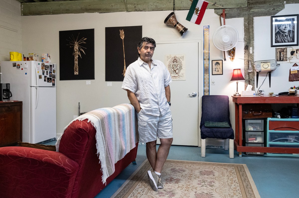 Photographer Ramin Samandari’s studio is decorated with some of his own pieces as well as items from his home Iran.