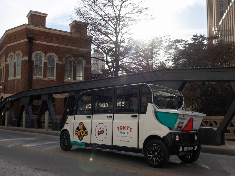 Kevin and Liz Mancha drive in one of their brand new electric trolleys downtown Wednesday. People who are interested in hoping on a free ride can book an appointment online or hail them on the street.