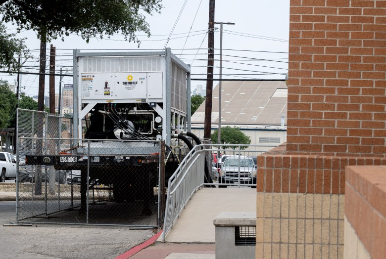 A large chiller is connected to one of the boiler rooms outside of Sidney Lanier High School Friday. This helps to deliver cool or warm air to one of the wings of the school.