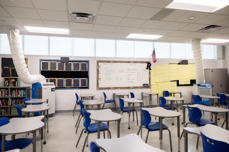 Temporary cooling systems helps to regulate the temperature inside one of the classrooms at Sidney Lanier High School Friday.