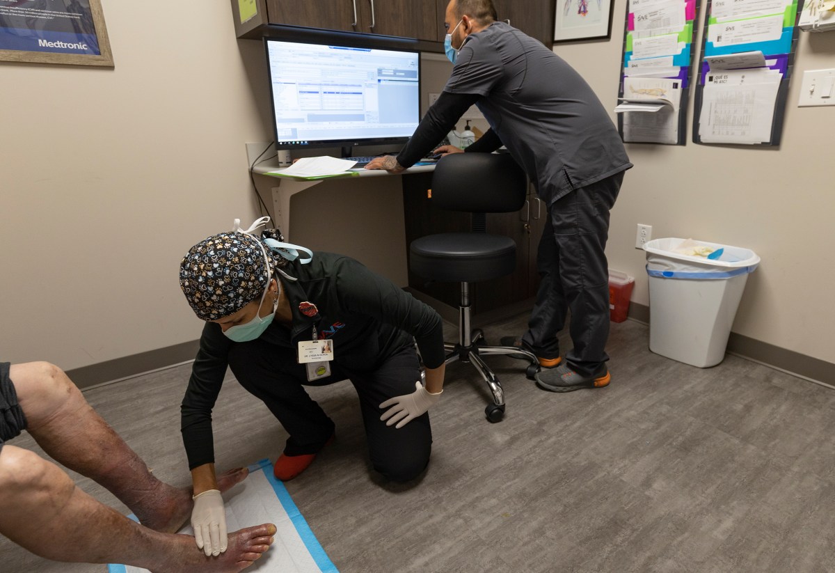 Dr. Lyssa Ochoa examines a patient at the San Antonio Vascular and Endovascular Clinic.