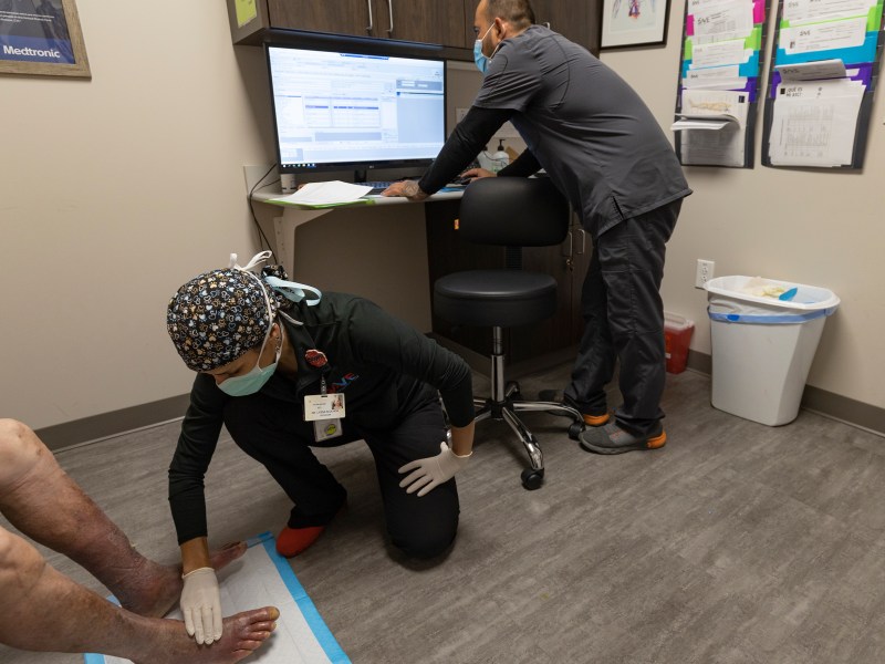 Dr. Lyssa Ochoa examines a patient at the San Antonio Vascular and Endovascular Clinic.