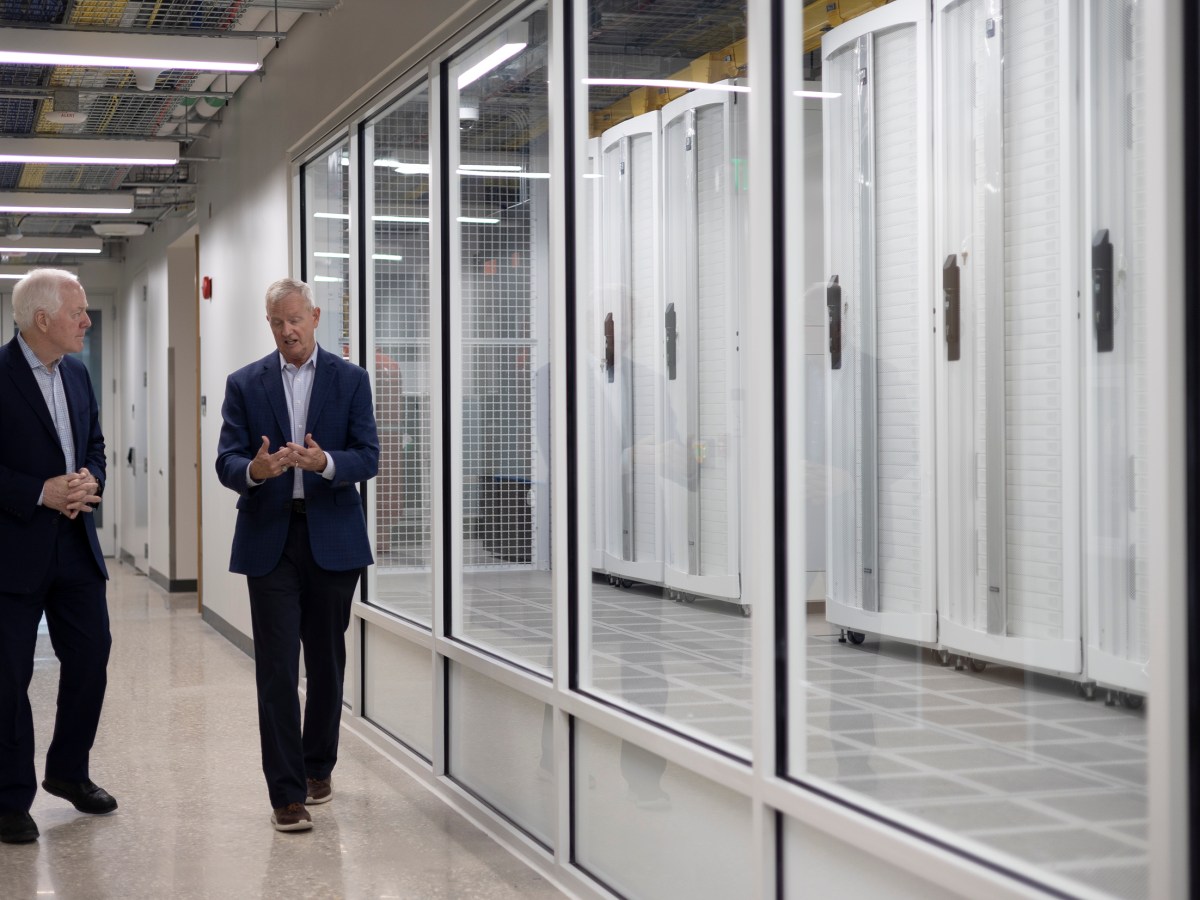 U.S. Senator John Cornyn (left) tours UTSA’s new School of Data Science with the university’s Executive Director of National Security Collaboration Center, Guy Walsh Wednesday.