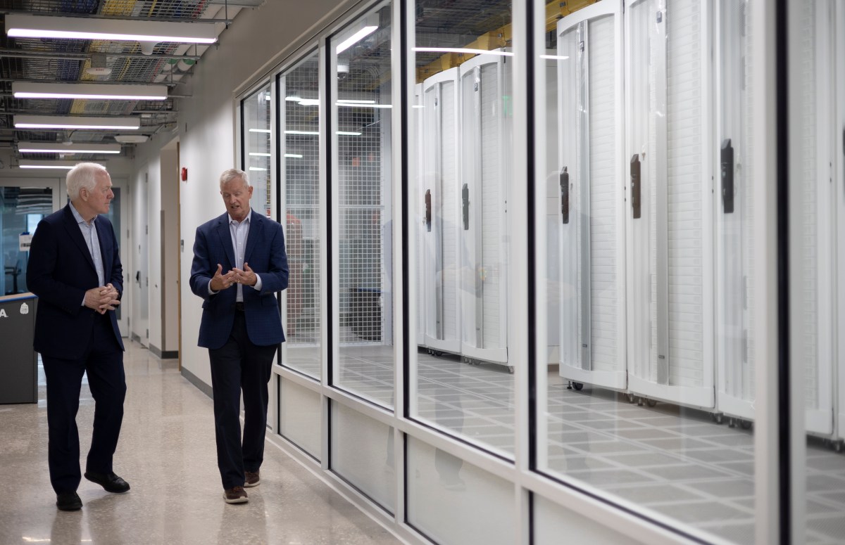 U.S. Senator John Cornyn (left) tours UTSA’s new School of Data Science with the university’s Executive Director of National Security Collaboration Center, Guy Walsh Wednesday.