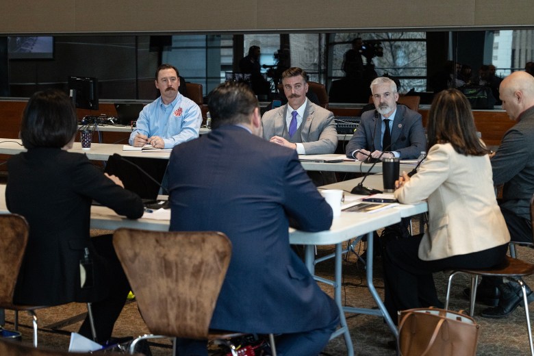 City Officials meet with the fire union on the first day at the International Center on Thursday.