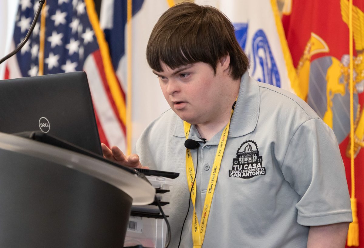 Daniel Lawler presents what he learned during his time as a Tu Casa student Friday. Tu Casa is a program at Texas A&M San Antonio that allows students with intellectual disabilities to gain life skills while attending college classes.