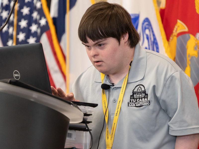 Daniel Lawler presents what he learned during his time as a Tu Casa student Friday. Tu Casa is a program at Texas A&M San Antonio that allows students with intellectual disabilities to gain life skills while attending college classes.