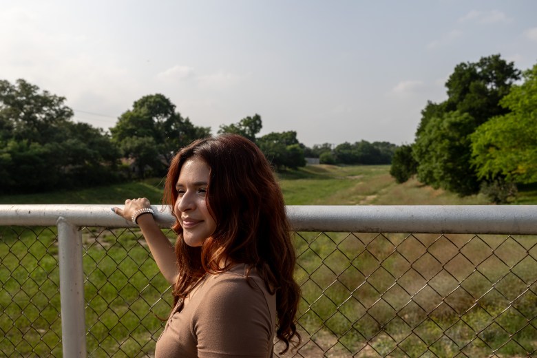 Melina Alvarado remembers many evenings watching the sunset with friends from this bridge nestled in her Whispering Oaks neighborhood.