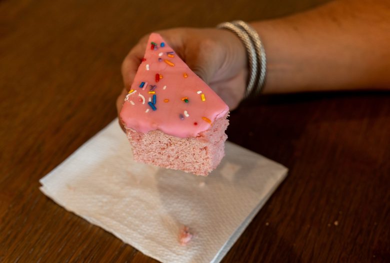 Jacob Valenzuela enjoys his favorite pink cake from Panaderia Jimenez.