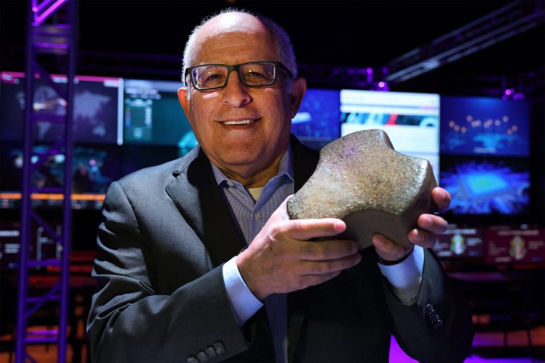 Sam Ximenes holds a brick made of moon dust on display at the Boeing Tech Port, Area 21 SAMSAT Museum on Friday, Dec. 15, 2023. Ximenes is a pioneering Mexican-American space architect and educator. In 2007, he founded Exploration Architecture Corporation (XArc) to serve the commercial space market. Ximenes is helping to devise equipment that will build material from moon dust and create habitats on the lunar surface. Ximenes is also using his extensive experience in the aerospace industry and started the WEX Foundation which bolsters science, technology, engineering and mathematics (STEM) programs to middle and high school students. His vision is to have robotics that he created be in use on the moon’s surface to build human habitats on future missions.