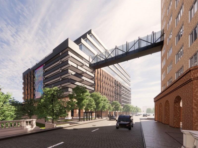 A rendering shows the street-level perspective of the former CPS Energy headquarters with a new design featuring updated offices and restaurant space.