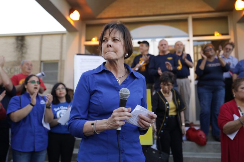 Shelley Potter, former president of the San Antonio Alliance of Teachers and Support Personnel, speaks to supporters outside a SAISD board meeting in 2018. 