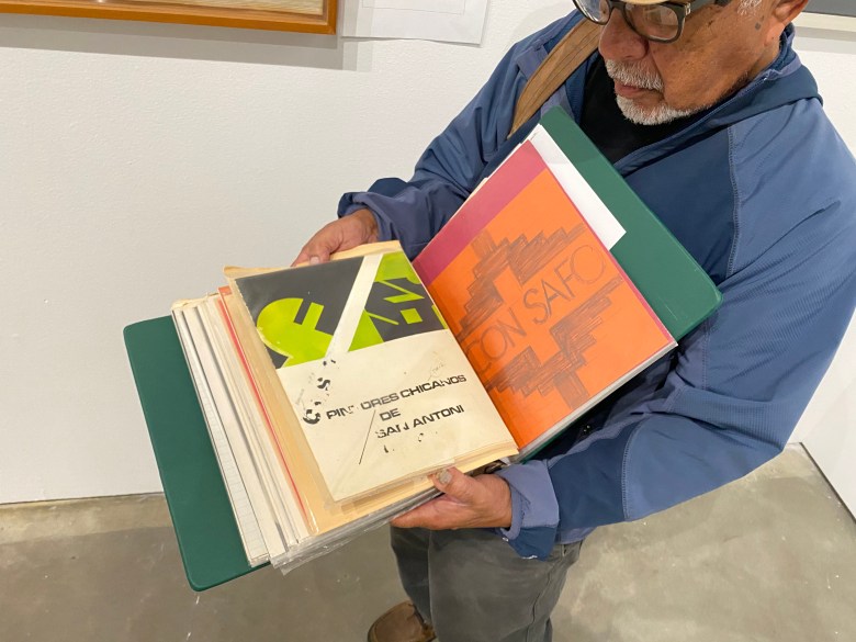 Artist José Esquivel shows the original logo design for the Con Safo group, among other founding documents in a personal archive he's kept since 1967.