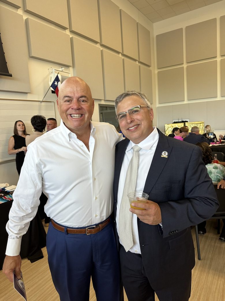 John Hayes (left) with Superintendent Saul Hinojosa at Somerset Independent School District's 100-year celebration.