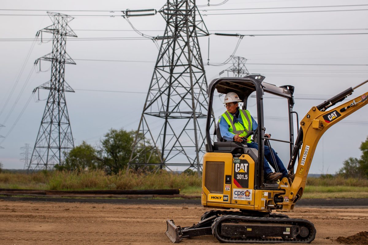 Patricia “Patty” Garcia operates a small backhoe at the CPS Calaveras Power Plant on Oct. 7.