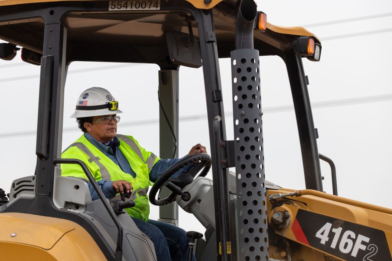 Leticia “Letty” Ortiz fills in a narrow line ditch at the CPS Calaveras Power Plant on Oct. 7.