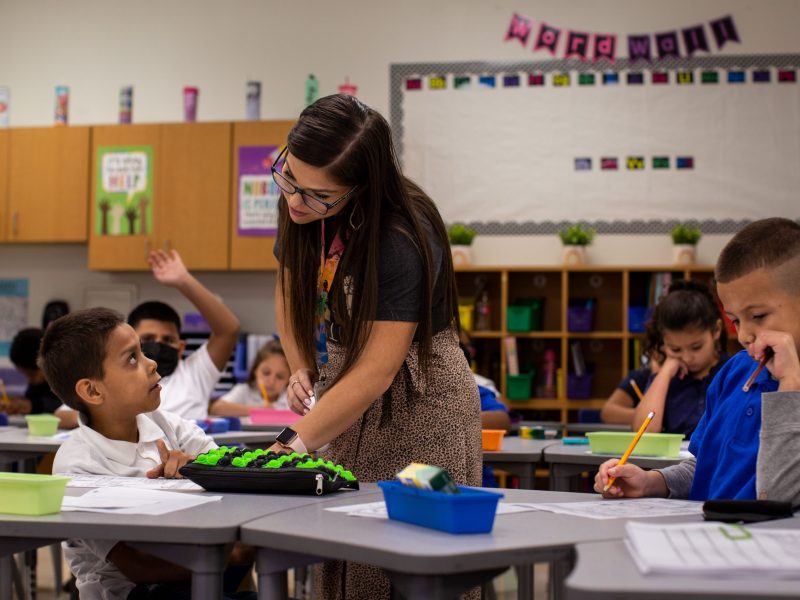 Second graders work on a letter to their teacher, Ashley Varos, at Stafford Elementary School in August.