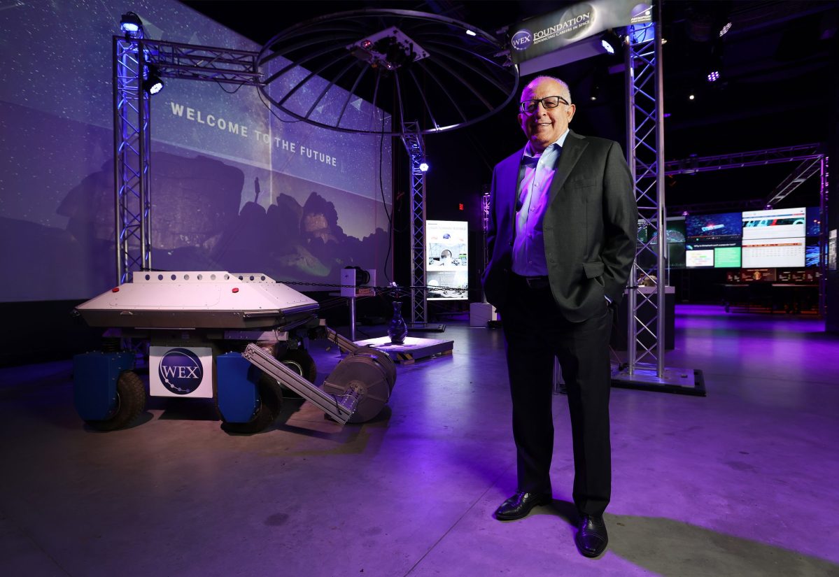 Sam Ximenes stands near what he calls his “Frankenbot” - a robot that is capable of excavating the lunar surface and create bricks from the moon dust - at the Boeing Tech Port, Area 21 SAMSAT Museum on Friday, Dec. 15, 2023. Ximenes is a pioneering Mexican-American space architect and educator. In 2007, he founded Exploration Architecture Corporation (XArc) to serve the commercial space market. Ximenes is helping to devise equipment that will build material from moon dust and create habitats on the lunar surface. Ximenes is also using his extensive experience in the aerospace industry and started the WEX Foundation which bolsters science, technology, engineering and mathematics (STEM) programs to middle and high school students. His vision is to have robotics that he created be in use on the moon’s surface to build human habitats on future missions.