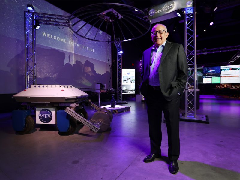 Sam Ximenes stands near what he calls his “Frankenbot” - a robot that is capable of excavating the lunar surface and create bricks from the moon dust - at the Boeing Tech Port, Area 21 SAMSAT Museum on Friday, Dec. 15, 2023. Ximenes is a pioneering Mexican-American space architect and educator. In 2007, he founded Exploration Architecture Corporation (XArc) to serve the commercial space market. Ximenes is helping to devise equipment that will build material from moon dust and create habitats on the lunar surface. Ximenes is also using his extensive experience in the aerospace industry and started the WEX Foundation which bolsters science, technology, engineering and mathematics (STEM) programs to middle and high school students. His vision is to have robotics that he created be in use on the moon’s surface to build human habitats on future missions.